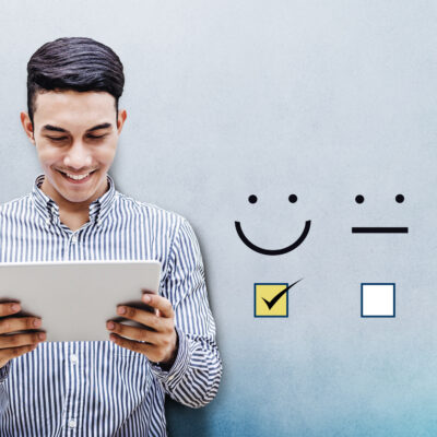 Customer Experience Concept Happy Businessman Holding Digital Tablet with a Checked Box on Excellent Smiley Face Rating for a Satisfaction Survey 5 secret hacks to improve user experience on your website
