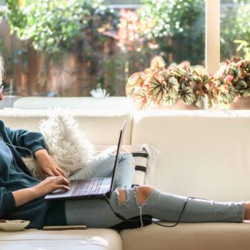 106450111 1584543859260nominated already teenage girl sitting on the white couch and using laptop t20 4lndkv top lounger designs for the remote worker