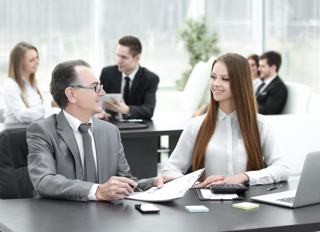 Marketer and Team Manager Working with Paper Charts what is domain expertise and how does it relate to marketing