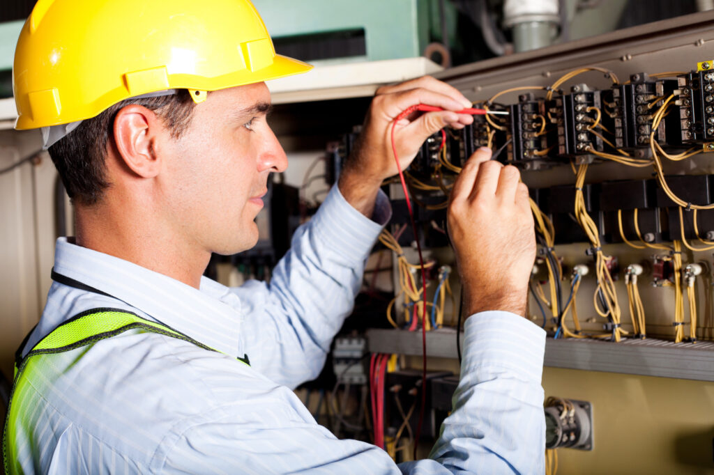 Electrician Testing Industrial Machine how do i choose the best electrician in my local area